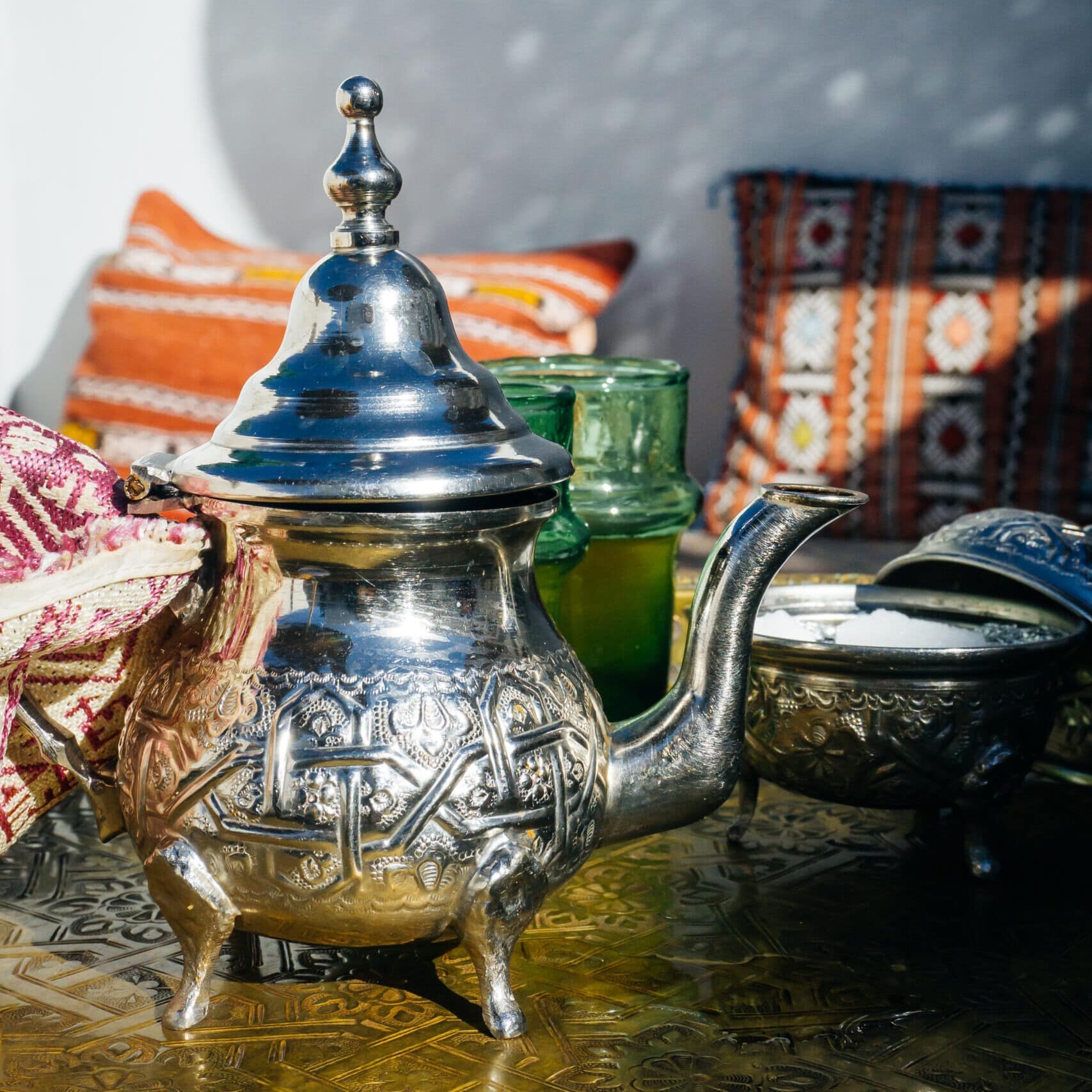 Arabian Mint Tea. Moroccan Mint Tea. The national hot drink in the Middle East and the Muslim world. Served in a special iron silver teapot with sugar. High quality photo